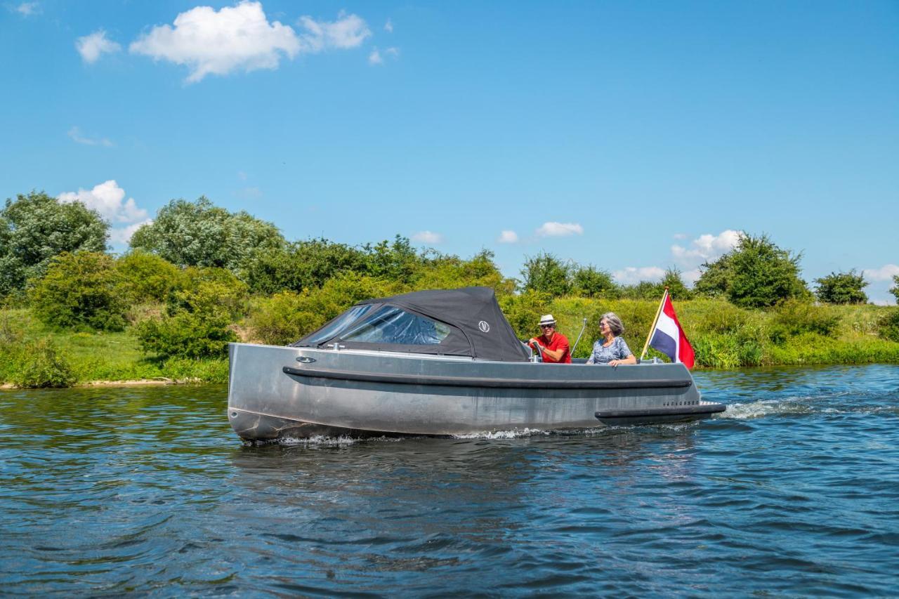Vakantiepark Aan De Maas Kerkdriel Bagian luar foto