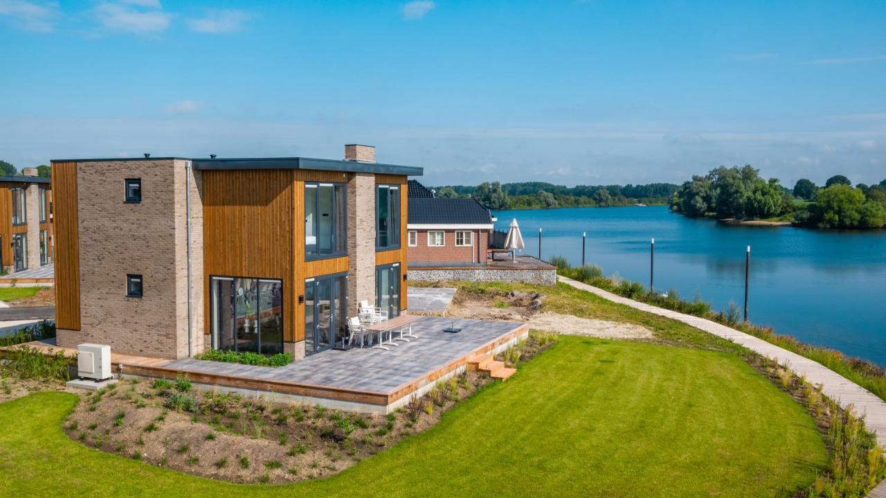 Vakantiepark Aan De Maas Kerkdriel Bagian luar foto